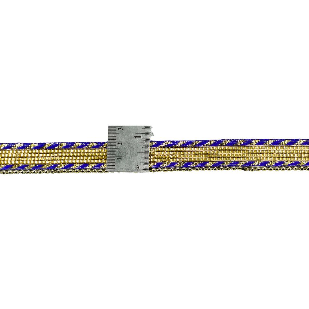 Gold and blue braided cord with a ruler for scale on a white background